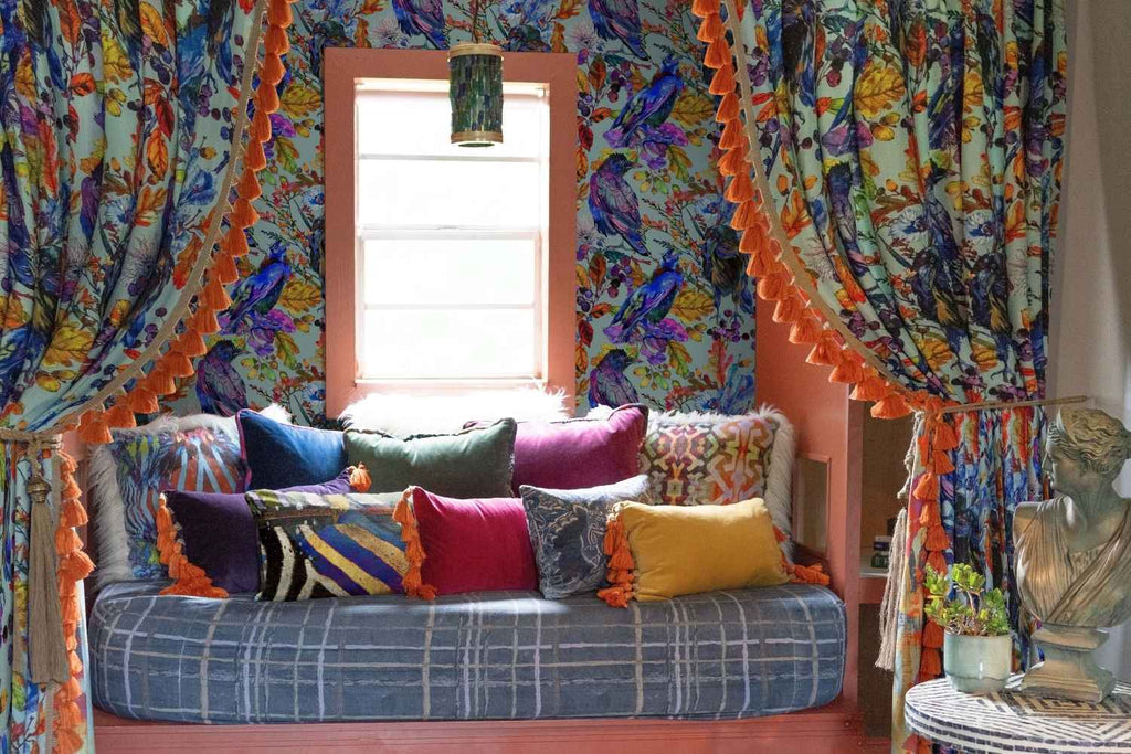 maximalist reading nook with wallpaper and curtains