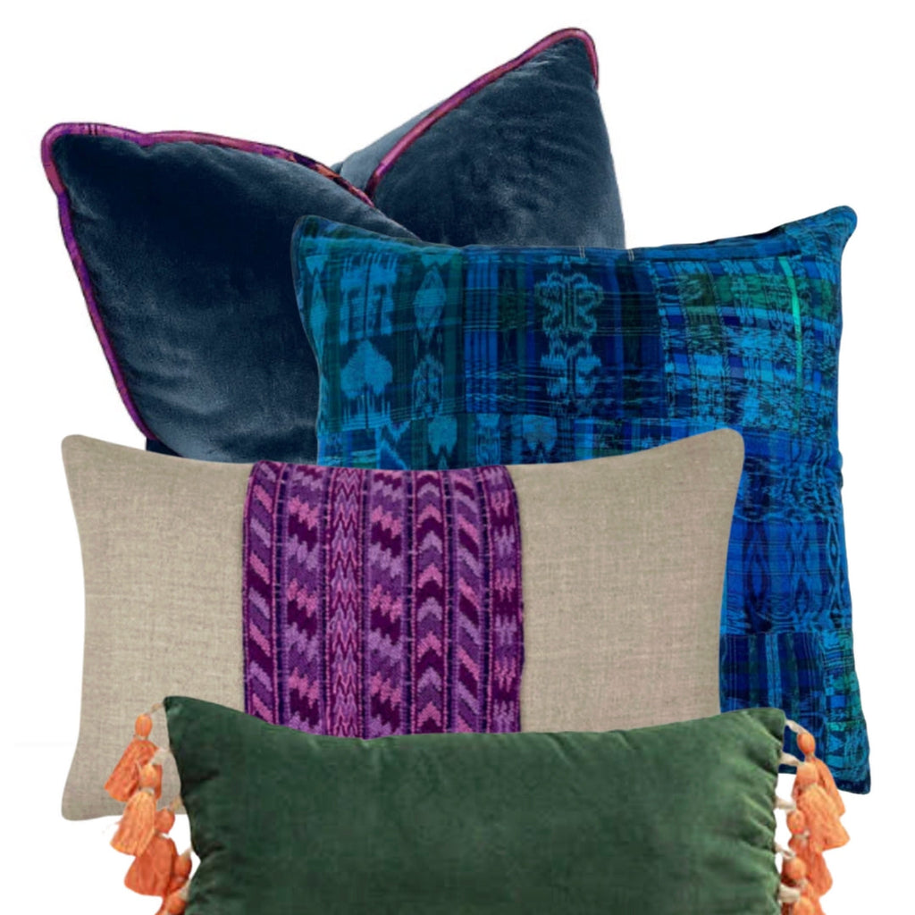Collection of decorative pillows with various patterns and colors on a white background