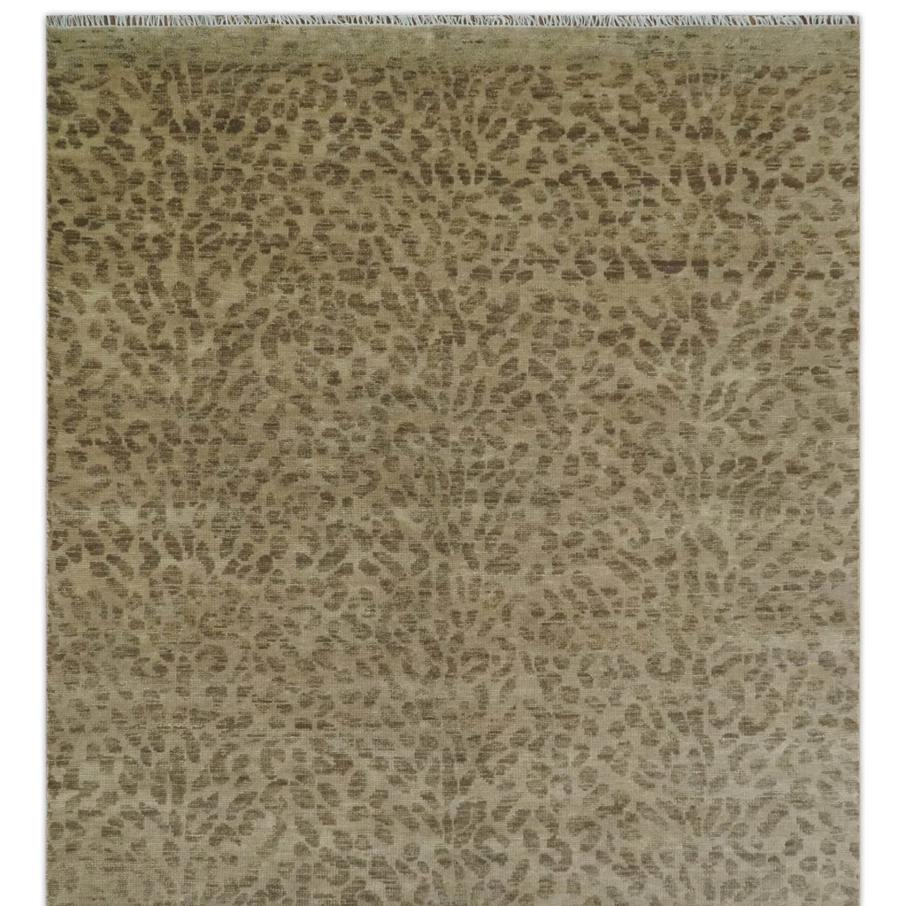 Leopard cheetah pattern rug with neutral color scheme on a plain background