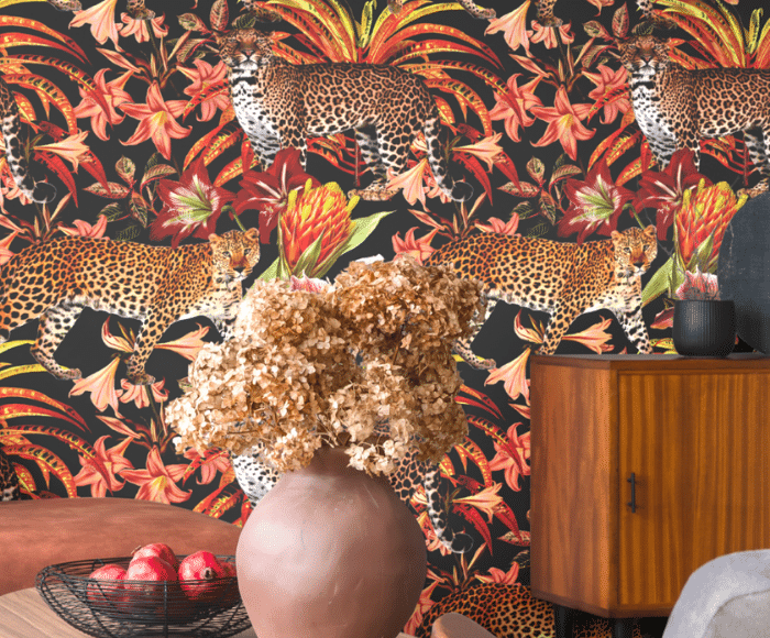For her recent dining room project, friend and interior decorator Tiffany Brown based the space around one specific item: SmithHönig’s new Pantera peel & stick wallpaper. The end result is a luxe, dramatic space that is anything but tame. Read on to see how Tiffany achieved this bold, sexy, and vibrant look.